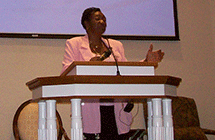 Joan Speaking at Breast Cancer Awareness Event